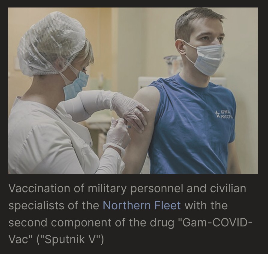 Screenshot of image from Spooteen V Wikipedia page, it's captioned: "Vaccination of military personnel and civilian specialists of the Northern Fleet with the second component of the drug "Gam-COVID-Vac" (Sputnik V)"