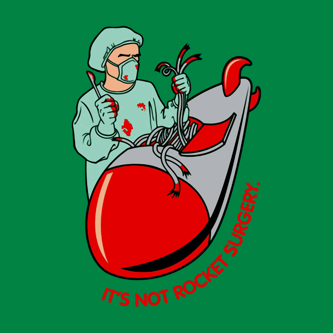 Surgeon operating on some sort of missile, it's captioned "It's not rocket surgery"